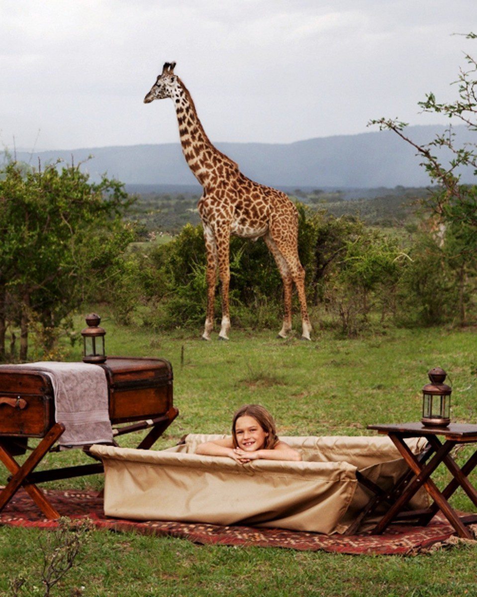 The Case for Taking Your Kids on Safari, Giraffe at Camp